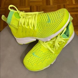 Highlighter Yellow/Green Nike Flyknit Trainers.